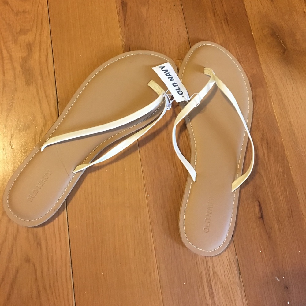 Tan flip flops